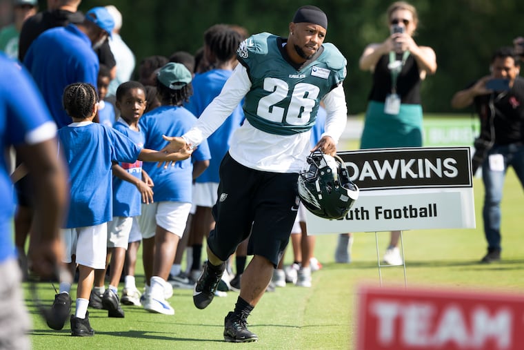 Eagles running back Saquon Barkley takes the field during training camp on July 28.