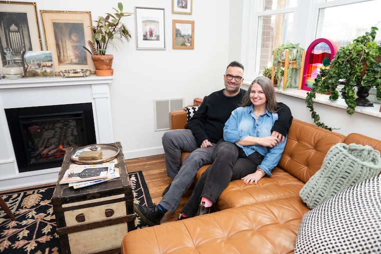 Karsten Roberts (left) and Catherine Wargo Roberts in their home in South Philadelphia.