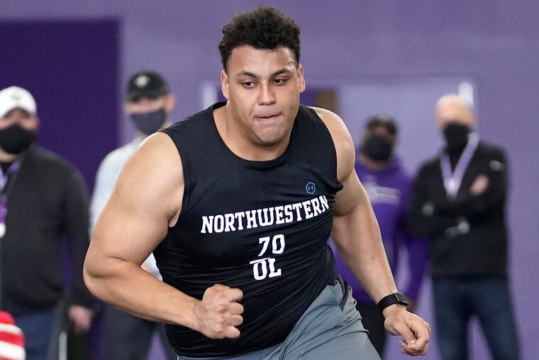 Northwestern offensive lineman Rashawn Slater participates in the school's pro day workout for NFL scouts on March 9.
