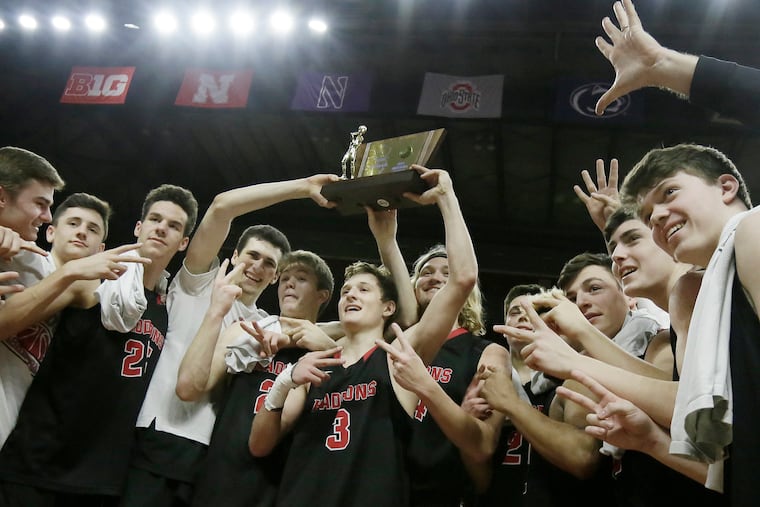 Haddonfield players celebrate winning the Group 2 state championship with a 64-53 victory over Newark West Side at Rutgers.