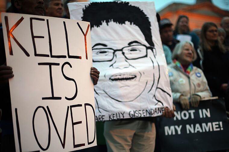 Death penalty opponents gather on the steps of the State Capitol in Atlanta on Monday, March 2, 2015, to protest the death penalty and the planned execution of Kelly Gissendaner. (AP Photo/Atlanta Journal-Constitution, Ben Gray)