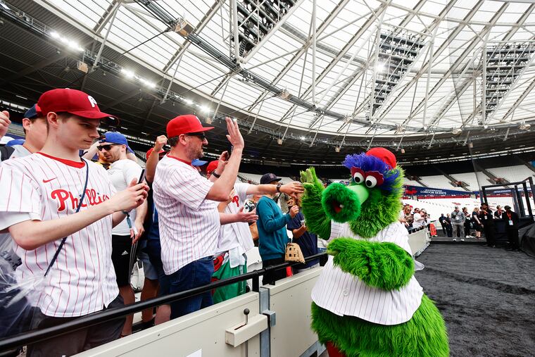 The Phillie Phanatic greets fans at London Stadium in London, England, which is hosting a two-game series between the Phillies and the New York Mets.