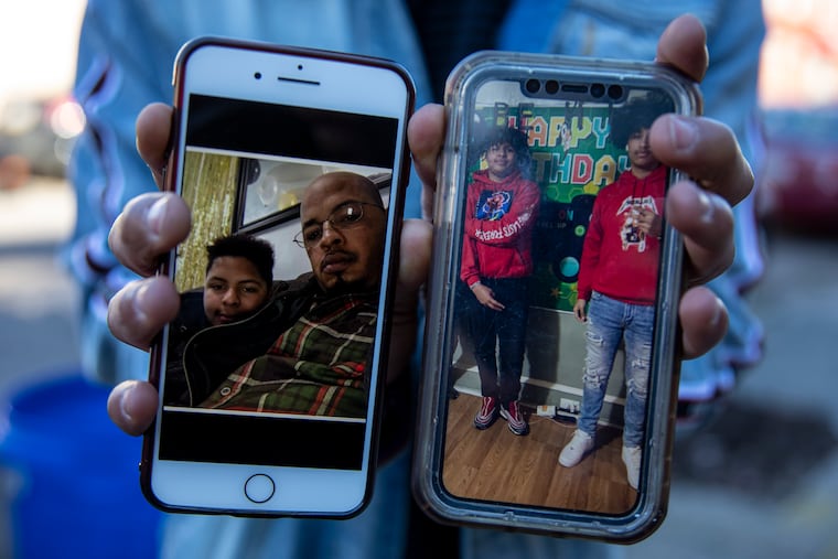A family member displays images of Jesus and Jeremy Perez (left). At right is Jeremy wth his cousin Giovanny Capulin, 17. Jesus Perez, 44, and his son Jeremy, 15, were shot and killed on Christmas morning in Kensington.