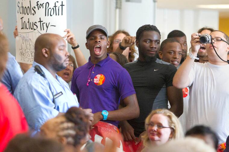 Philadelphia HS students, members of Youth United For Change, joined other protesters inside the packed SRC meeting. The School Reform Commission met in special session Thursday afternoon to vote on changes to union rules and contract talks as the Dr. Hite's deadline on whether schools will open looms. ( ED HILLE / Staff Photographer )