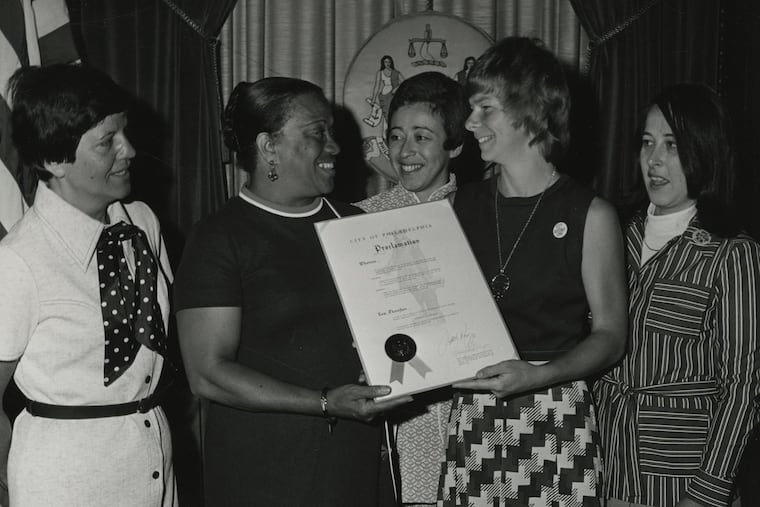 Receiving the City of Philadelphia's proclamation of August 26, 1974 as "Women's Rights Day," photograph (1974), National Organization for Women, Philadelphia Chapter records.