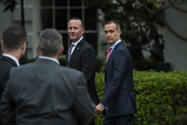 Corey Lewandowski, right, and another former member of Donald Trump's staff are largely admiring of the president in a campaign memoir, even as they chronicle their boss' voracious appetite for fast food and his explosive temper.