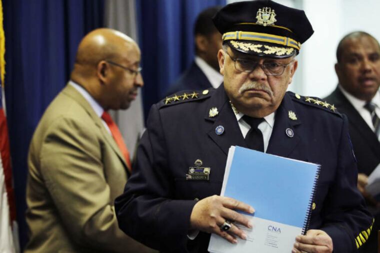 Police Commissioner Charles H. Ramsey presents the report from the U.S. Department of Justice, joined by Mayor Nutter (left). He pledged to move 'as quickly as we can' to come up with a plan to implement the recommendations.