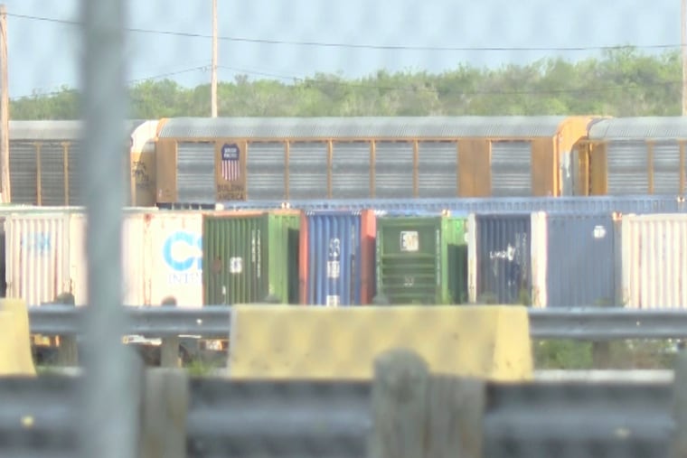 In this image taken from video footage provided by KGNS, Union Pacific train cars are stationed at a rail yard in Laredo, Texas, Sunday, May 10, 2026.