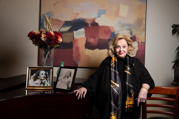 Rachel Billebault at Knock Restaurant, Oct. 10, 2025, in Philadelphia. Two photos of Rachel in the 70s are on the piano.