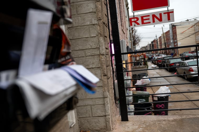 Mail piling up at homes in the 1900 block of N. 18th St in North Philadelphia on Wednesday, Dec. 10, 2025. Buyers have snapped up $45 million in student housing around Temple University, often paying more than twice what properties were originally listed for, even though rents are down and vacancies are up for student housing.