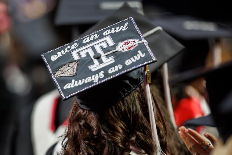 A Temple graduate at the Liacouras Center on May 11, 2023. The Education Department opened the new federal financial aid application for a beta testing period on Tuesday.
