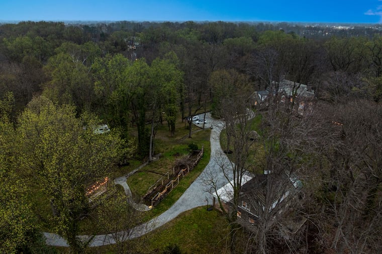 This 5-acre property in Wallingford, complete with a 7,500-square-foot main home and a 2,500-square-foot carriage home, is on the market for $2.15 million.