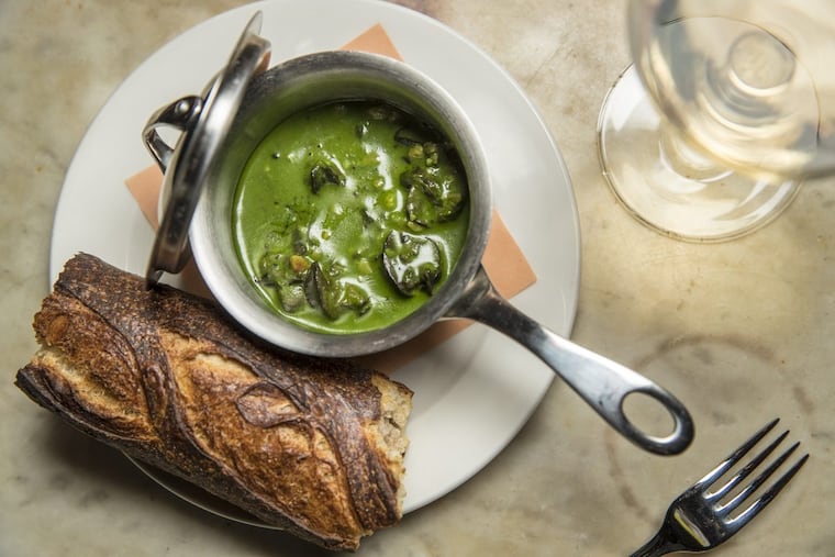The Champagne Braised Escargot with chartreuse-hazelnut butter and crisp baguette at Royal Boucherie.