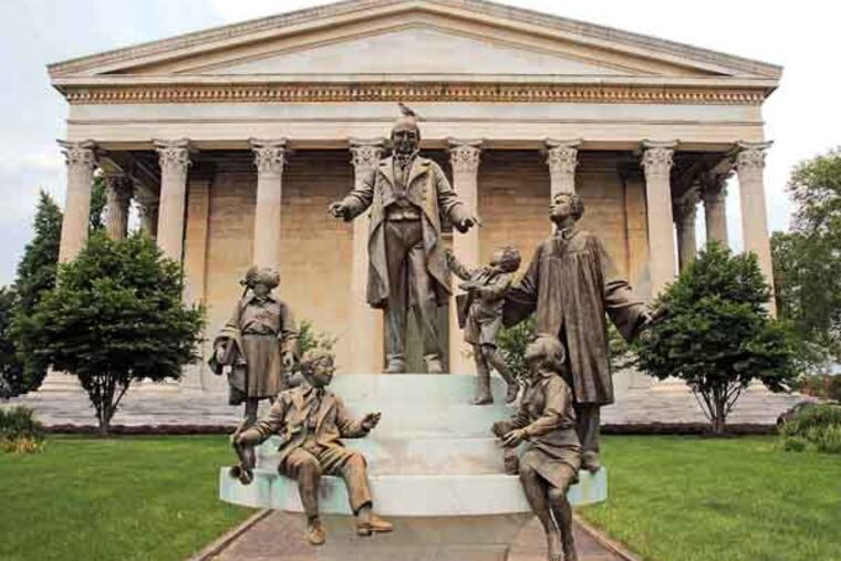 “The Spirit of Girard’ sculpture by Bruno Lucchesi greets visitors to Girard College, June 3, 2013. ( DAVID M WARREN / Staff Photographer )