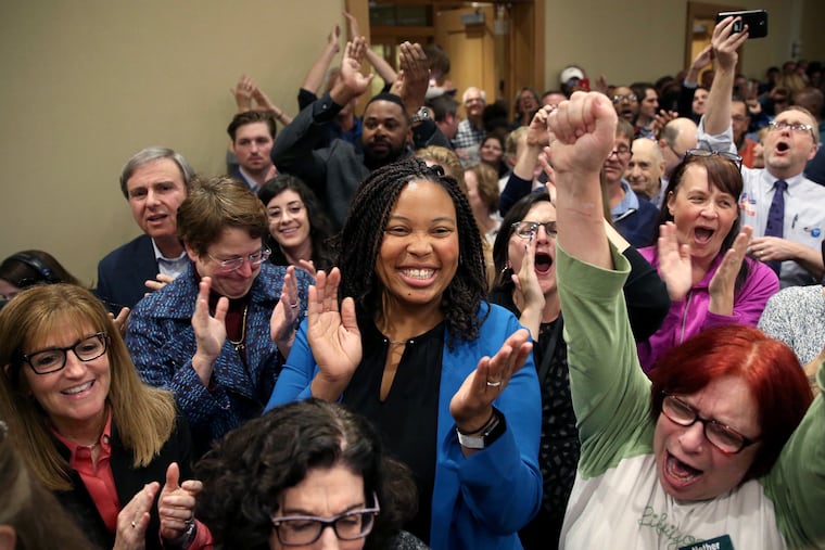 From left, Council candidates Elaine Schaefer (in red shirt and glasses), Christine Reuther (in patterned blue coat), and Monica Taylor (in blue blazer).celebrate during the Delaware County Democratic Committee election watch party at the Inn at Swarthmore on Tuesday, November 5, 2019. It is the first time since at least the Civil War that Democrats won control of the Delaware County Council.