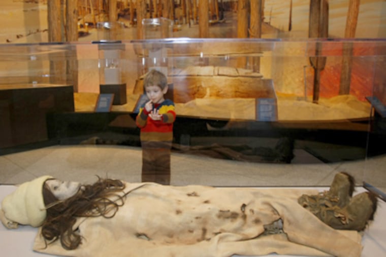 Eli Kranjec, 3, looks at a "dummy mummy" in a display case. The real object was supposed to be "The Beauty of Xiahoe" c. 1800-1500 BCE. (Michael S. Wirtz / Staff Photographer)