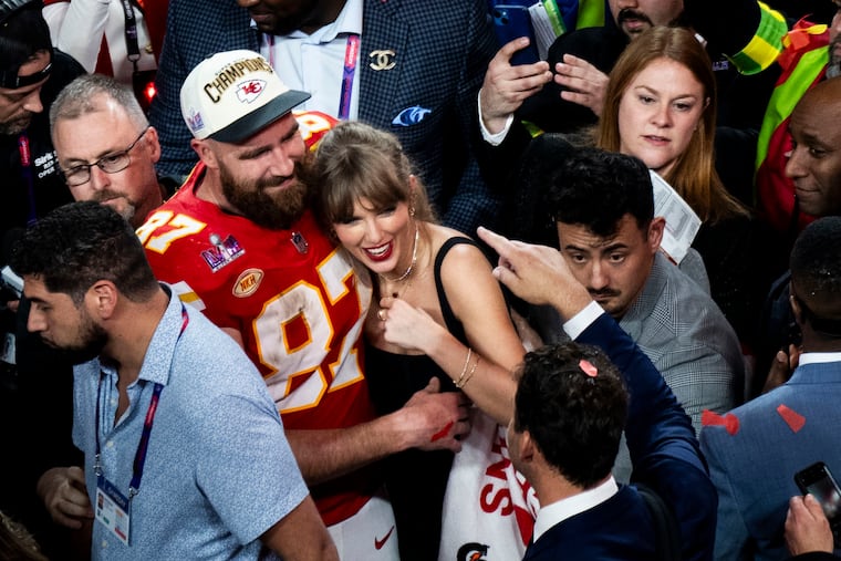 FILE — Taylor Swift embraces Kansas City Chiefs tight end Travis Kelce after the Chiefs won Super Bowl LVIII against the San Francisco 49ers at Allegiant Stadium in Las Vegas on Feb. 11, 2024.