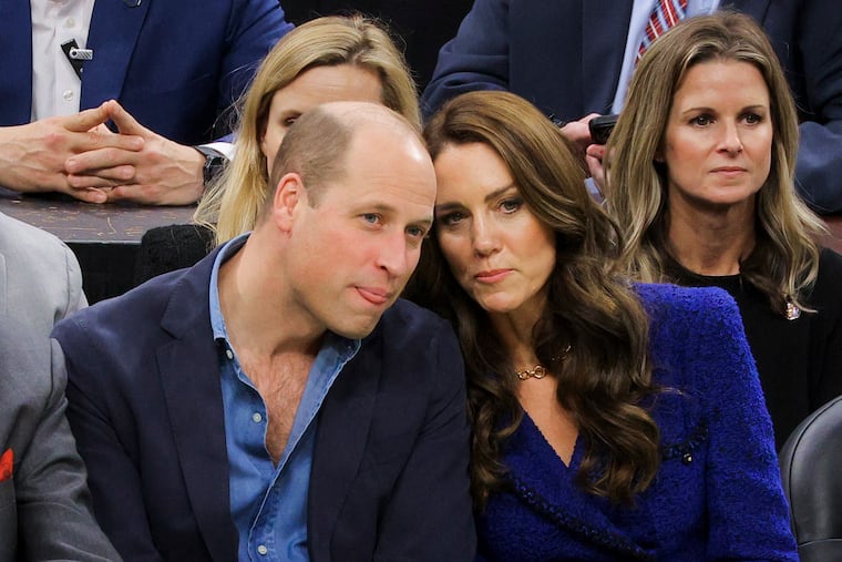 Britain's Prince William and Kate, Princess of Wales, watch a game between the Boston Celtics and Miami Heat on Wednesday in Boston.