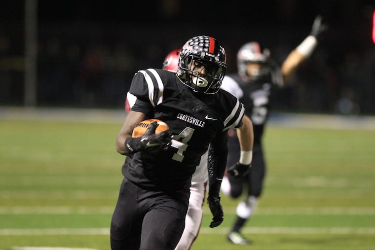 Coatesville Aaron Young runs for a long gain against St. Joseph's Prep in last season's PIAA Class 6A semifinal.