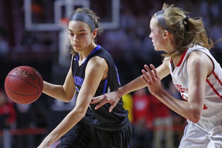 Central Bucks South’s Haley Meinel dribbles against Souderton’s Megan Walbrandt.