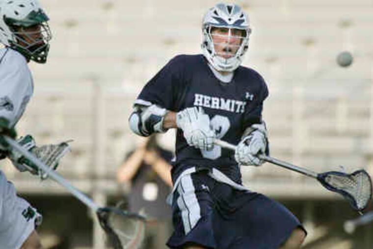 St. Augustine's Tommy O'Neill fires a shot into the goal with 5.7 seconds left in the Public A boys' lacrosse championship. St. Joseph's Metuchen withstood the comeback to win the title.