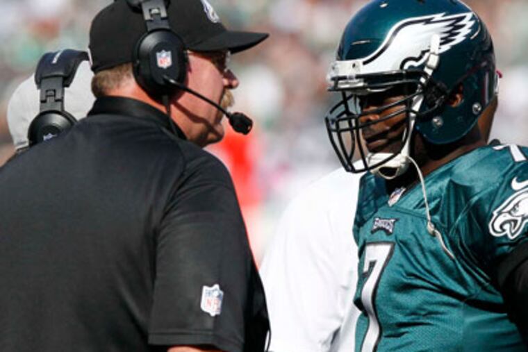 Andy Reid is under as much pressure to keep his job as quarterback Michael Vick. (Yong Kim/Staff Photographer)