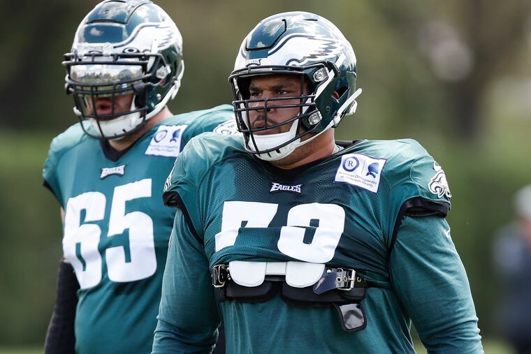 Eagles offensive linemen Brandon Brooks (right) and offensive tackle Lane Johnson during practice at the NovaCare Complex in South Philadelphia on Sunday, August 25, 2019
