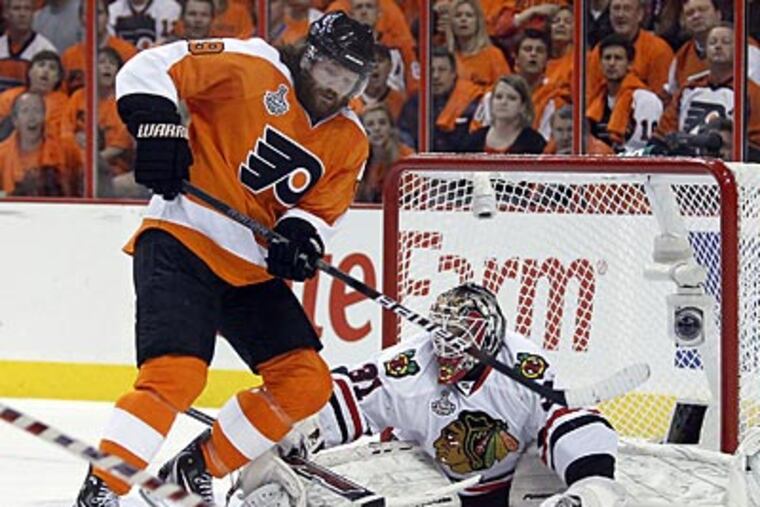 Scott Hartnell finished Game 3 of the Stanley Cup Finals with a goal and an assist. (Yong Kim / Staff Photographer)