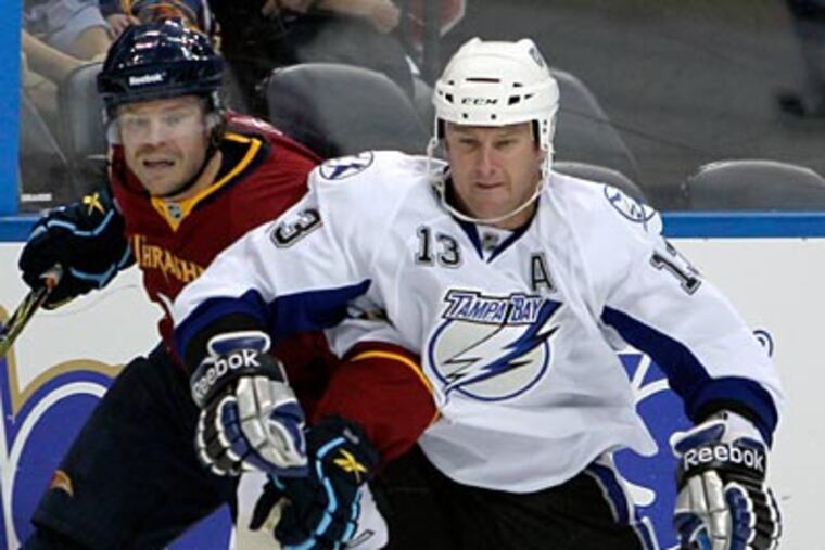 Pavel Kubina was acquired for two draft picks and minor-league forward Jon Kalinski. (David Goldman/AP file photo)