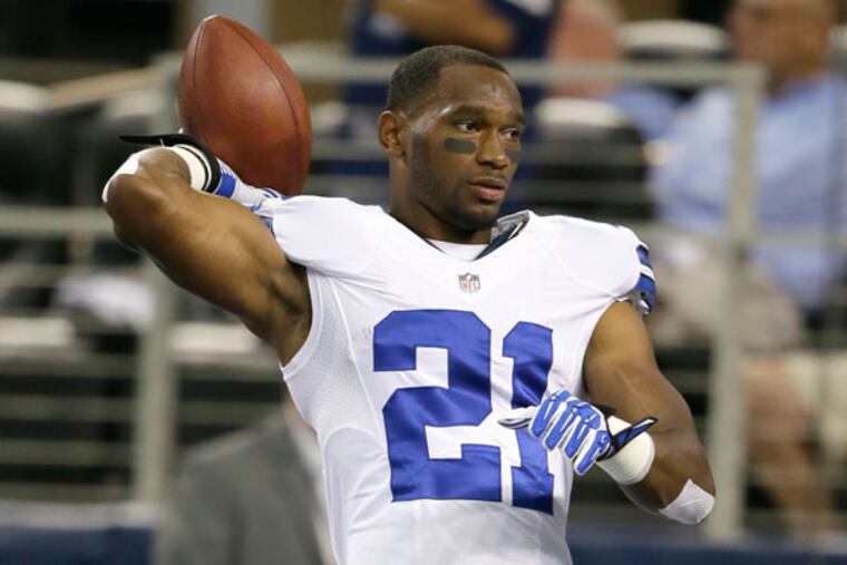 Cowboys running back Joseph Randle (21) warms up before a NFL football game Sunday, Sept. 8, 2013, in Arlington, Texas. (Tony Gutierrez/AP)