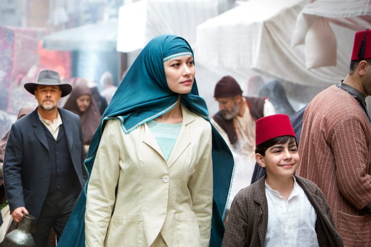 After the war: (from left) Russell Crowe, Olga Kurylenko, and Dylan Georgiades in "The Water Diviner." (Mark Rogers/Warner Bros. Pictures)