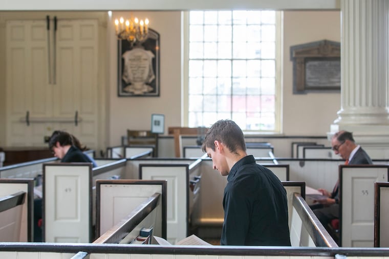 Members of Christ Church sit apart from each other during service to an almost empty church because Coronavirus concerns in Old City, Philadelphia, PA on Sunday, March 15, 2020.