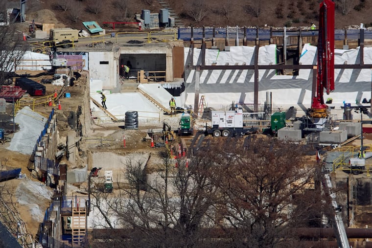Construction crews on the site of the White House's former East Wing, where the ballroom is proposed to be built.