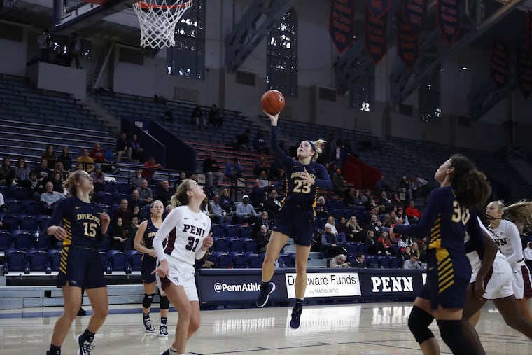 Drexel's Bailey Greenberg dribbles down the middle and goes up for a shot against Penn on Dec. 20.