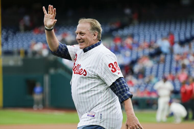 Curt Schilling waves during a reunion of the 1993 Phillies in June 2018 in Philadelphia.