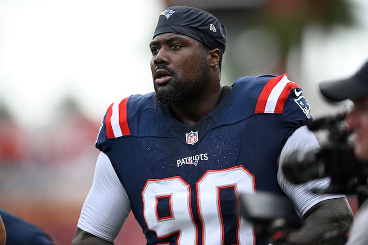 New England Patriots defensive lineman Christian Barmore warming up before a game against the Tampa Bay Buccaneers on Nov. 9.