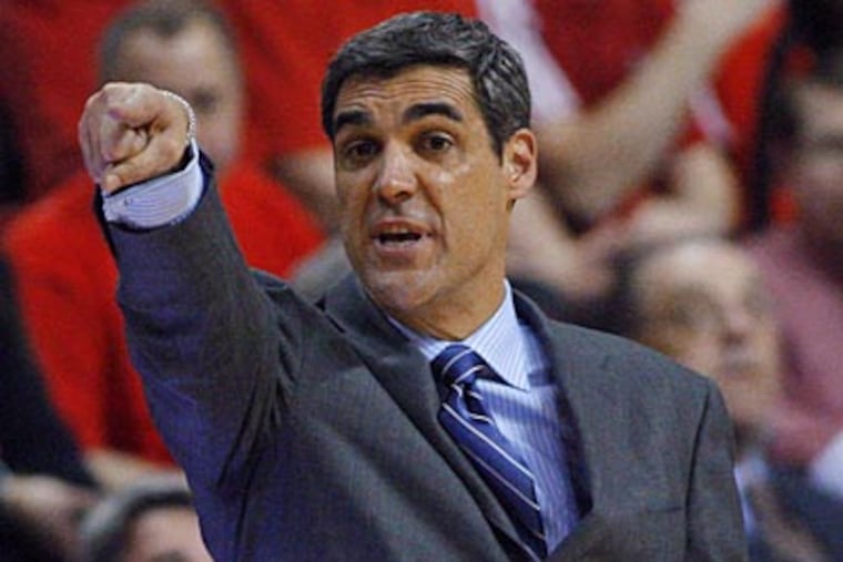 Jay Wright's Wildcats escaped with a 77-71 win at Rutgers on Thursday night. (Rich Schultz/AP)