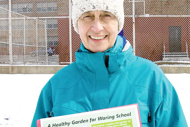 Ann Northrup of Philadelphia from the neighborhood around 18th and Green St. as seen on Tuesday, March 4, 2014. Residents in this neighborhood want to develop this empty lot into a dog park. Ms. Northrup would like a garden and the church next door is concerned about the possible smell.