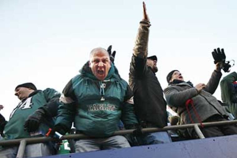A vocal Eagles fan enjoys the moment as the clock winds down on the Eagles' victory over the Giants on Sunday. (Eric Mencher/Staff Photographer)