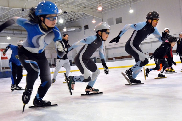 Instructor Kyle Carr ,back L, leads drills during a class of the East Penn Speedskating Club at the Body Zone in Reading Pa. on Sunday January 21,2018. Mark C Psoras/For the Inquirer