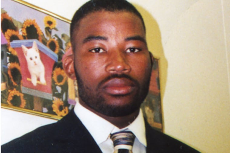 Family snapshot of Fassara Kouyate, who was fatally shot June 23 working his second job, at a car wash near Broad and Lehigh.