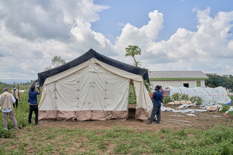 Aid workers set up an Ebola treatment center in Bunia, Congo, Tuesday, May 19, 2026.