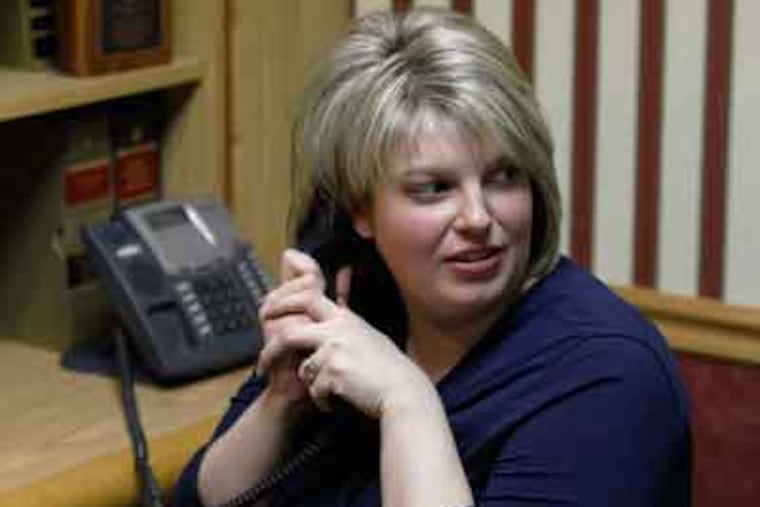 Central Bucks, Pa., East High School teacher Natalie Munroe at her attorney's office in Feasterville. Munroe was suspended from her job over profanity-laced posts on her blog. (AP Photo/Matt Rourke)