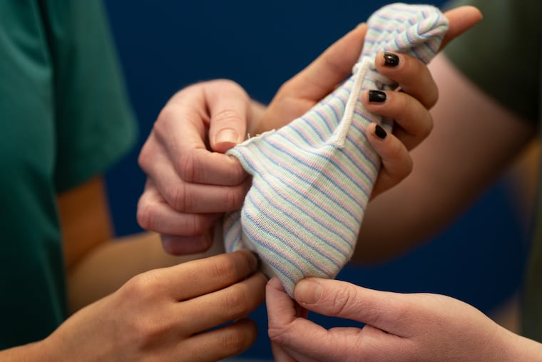 The beanie designed by Gabriella Daltoso and Sophie Ishiwari at the Hospital of the University of Pennsylvania. Their company, Sonura, is one of the start-ups launched in Philadelphia in recent years.