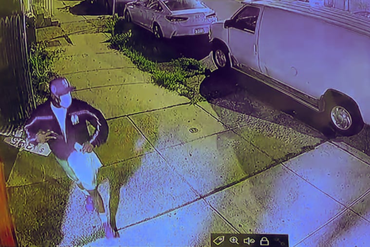 Surveillance video footage from a nearby business shows who police say is Shariff Perry before he allegedly killed Michelle Wilson, 61, and shot her 67-year-old husband on Aug. 9 at their Strawberry Mansion home.