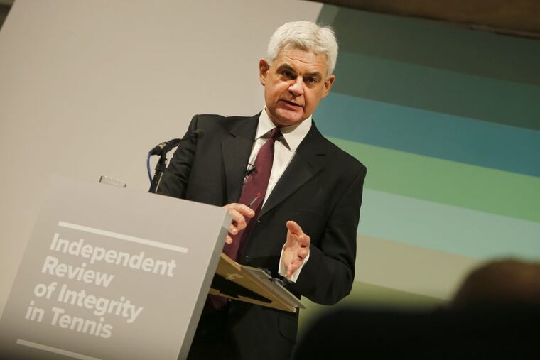 Lawyer Adam Lewis answers a question from the media during a press conference at the launch of the Independent Review of Integrity in Tennis interim report in London, Wednesday. An independent panel's two-year review of corruption in tennis has found that the sport "faces a serious integrity problem" at its lowest levels — a "tsunami," according to one investigator — but no widespread problem at ATP, WTA, and Grand Slam tournaments.