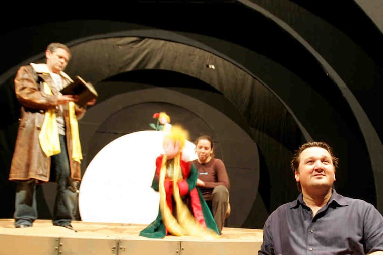 Scott Hitz directs Leila Ghaznavi and Lenny Haas as the Aviator in "The Little Prince." Hitz founded the Monkey Boys Productions puppet shop in 2000 with fellow puppet designers and builders Marc Petrosino and Michael Latini, all of whom cut their puppet teeth on the Broadway productions of "Avenue Q" and "Little Shop of Horrors." Their work has been seen everywhere from Carnegie Hall to Comedy Central.