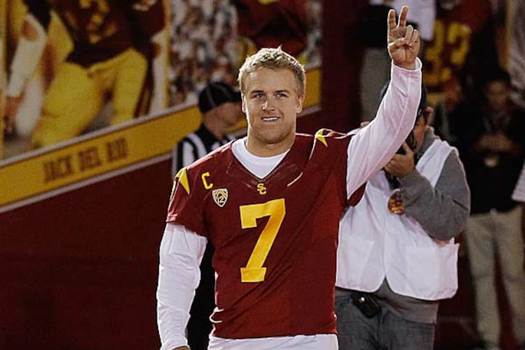 USC quarterback Matt Barkley walks from the tunnel as he is introduced to the crowd last during a senior ceremony before the game against Notre Dame, Saturday, Nov. 24, 2012, in Los Angeles. (Danny Moloshok/AP)