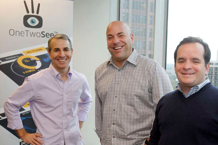 OneTwoSee founders Jason Angelides (center) and Chris Reynolds (right) with Rob Pace, the company's chief business "officer." (Akira Suwa / Staff Photographer)
