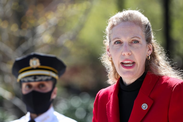 Acting U.S. Attorney Jennifer Arbittier Williams stands next to Philadelphia Police Commissioner Danielle Outlaw (left) while announcing a collective federal agency initiative to combat the epidemic of violence in the city.